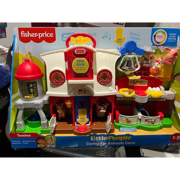 Fisher-Price Little People Caring for Animals Farm Playset...